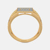 Gold ring from above with square diamond panel and prong-set stones.