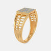 Gold ring view of band with engraved arch pattern and small stone accents.