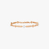 Gold prism link bracelet with chain and clasp, geometric bar segments