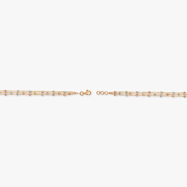 Tria Flow gold bracelet with two-row chain and small stones, adjustable clasp ends