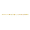 Yellow gold carved bead bracelet laid flat with lobster clasp at end
