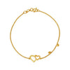 Gold heart bracelet with double heart charm on center link chain