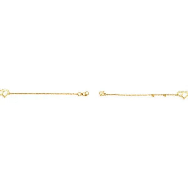 Gold heart bracelet with heart motif and clasp-side end link details