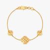Gold-tone geometric bracelet with square links and central lattice motif
