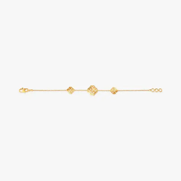 Gold-tone geometric bracelet chain with small diamond and square link charms