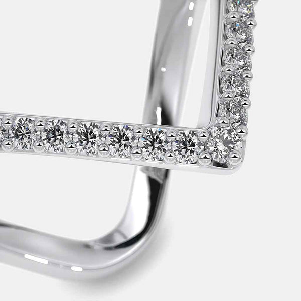 Chevron diamond ring with rows of round pave diamonds on the band