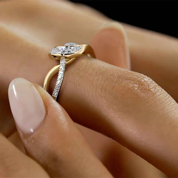 Gold ring with stacked diamonds on finger; slim vertical diamond line