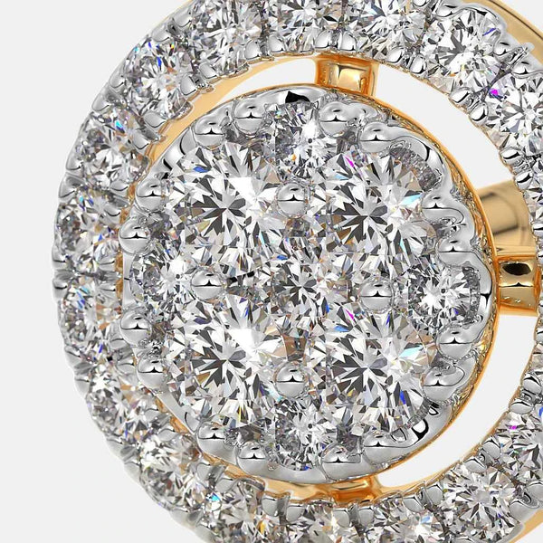 Close-up of round diamond halo stud earring with gold rim and pavé stones