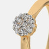 Yellow gold diamond cluster ring with prong-set round stones and halo border