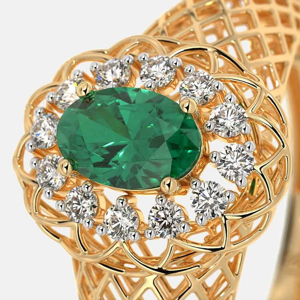 Gold ring with large oval green gemstone surrounded by round diamond halo