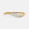 Gold bangle side view with pavé diamond stripe across the center