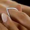 Chevron diamond ring with V-shaped pave stones on a silver-toned band