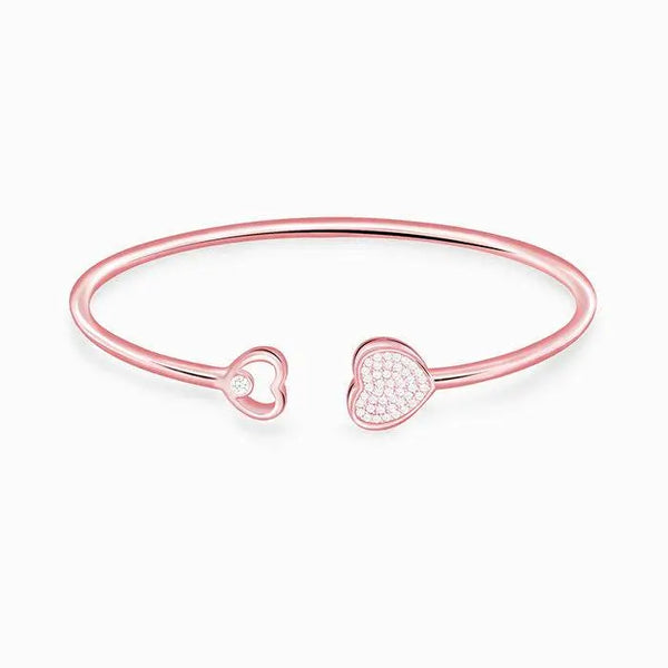 Rose gold heart bracelet with two heart charms, pavé sparkle and crystal accent