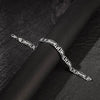Silver link bracelet with rectangular interlocking links and clasp detail