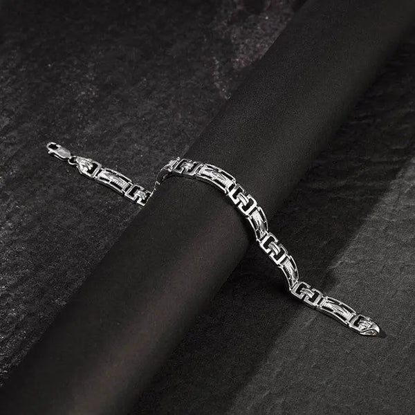 Silver link bracelet with rectangular interlocking links and clasp detail