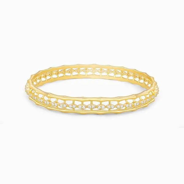Gold bangle bracelet, oval openwork lattice with clear stone border