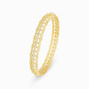 Gold bangle bracelet with openwork lattice and a slim, rounded profile