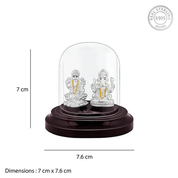Silver Lakshmi and Ganesha idol under glass dome, 925 stamp, 7.6 cm.