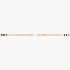 Gold bracelet end view with black beads and round clasp links
