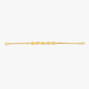 Gold vine charm bracelet laid flat, with toggle clasp and repeating ornamental links