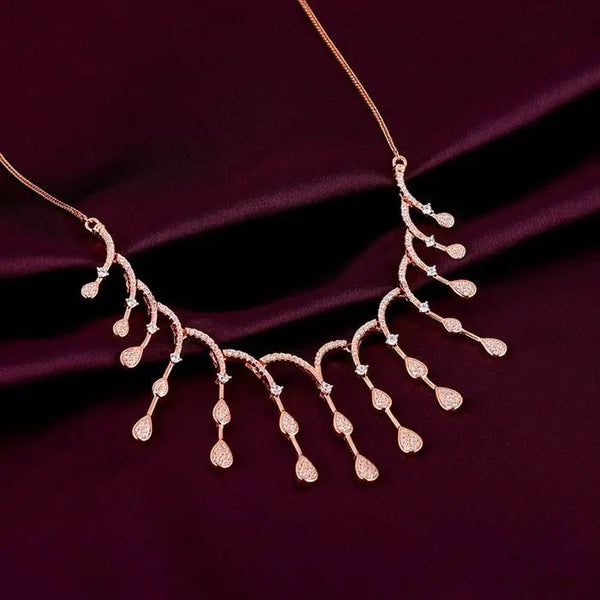 Rose gold necklace with dangling teardrop and heart-shaped charm drops