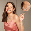 Silver-tone gemstone necklace with small pavé stones, worn at collarbone