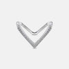 Chevron diamond ring with a V-shaped pave stone setting on polished metal
