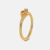 Gold ring with raised crown prongs holding a small diamond