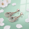 Layered Teardrop Silver Dangle Earrings with a Unique Textured Pattern - Aggarwal jewels