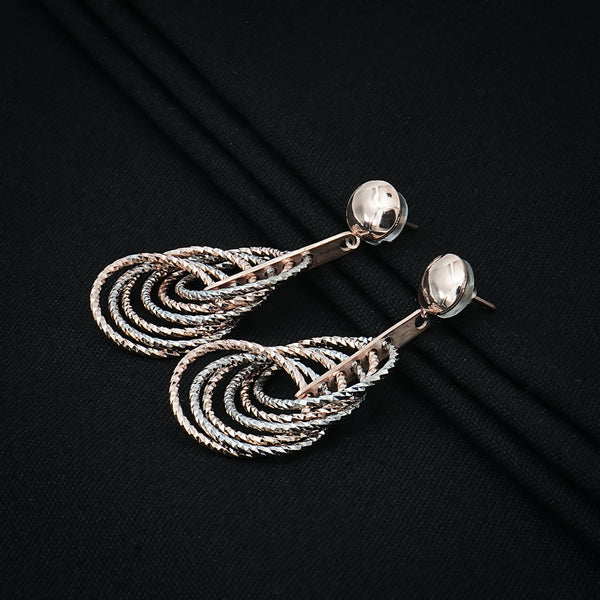 Layered Teardrop Silver Dangle Earrings with a Unique Textured Pattern - Aggarwal jewels