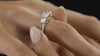 The Joel Three Stone Solitaire Ring